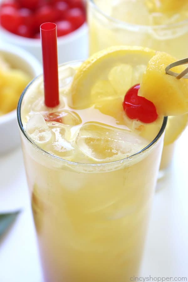 Pineapple Lemonade - We make it with fresh pineapple, fresh lemons, and a bit of brown sugar. You will find it easy to make and so super tasty! #Pineapple #Lemonade #Summerdrink
