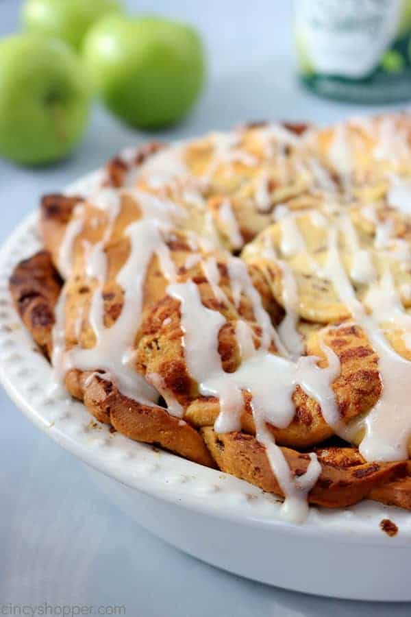 2 Ingredient Cinnamon Roll Apple Pie - so easy to make. We use store bought cinnamon rolls and canned apple pie filling to keep it so simple. #ApplePIe #ThanksgivingPie #2Ingredient