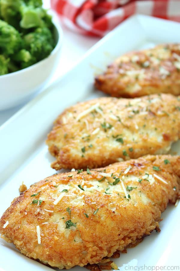 Parmesan Crusted Chicken -We use pounded thin chicken breasts, coat in a delicious Parmesan coating, and then fried to make them crispy.  Add this chicken idea to your dinner this week.