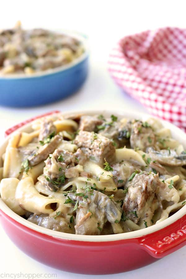 Slow Cooker Beef Stroganoff - tender beef tips, onions, mushrooms, all in a creamy sauce. Serve over egg noodles for an easy family favorite meal. Make it in your Crock-Pot!