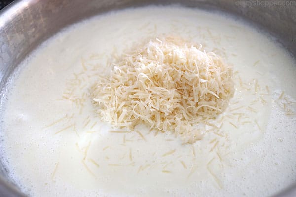 Adding Parmesan to pan