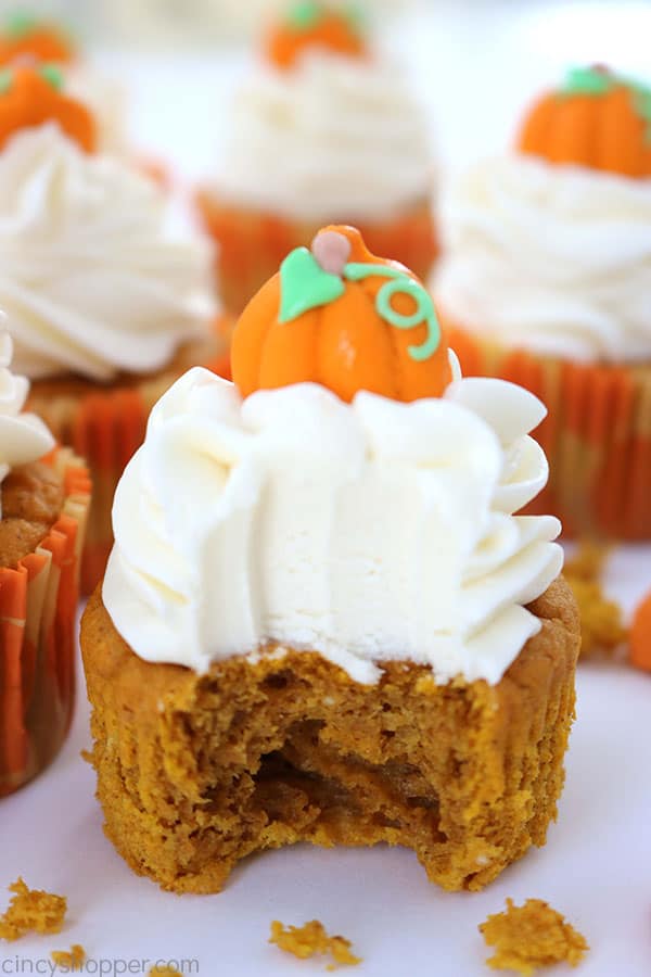 Easy Pumpkin Cupcakes with Cream Cheese Frosting- No need to make them from scratch when you can use a simple cake mix. Great for fall and Thanksgiving dessert.