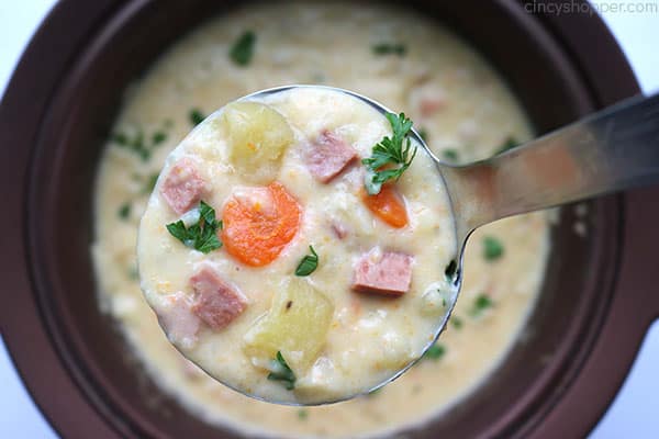 The BEST Slow Cooker Ham and Potato Soup - Perfect amount of potatoes, vegetables, ham and creaminess. It’s so simple because you make it right in your Crock Pot!