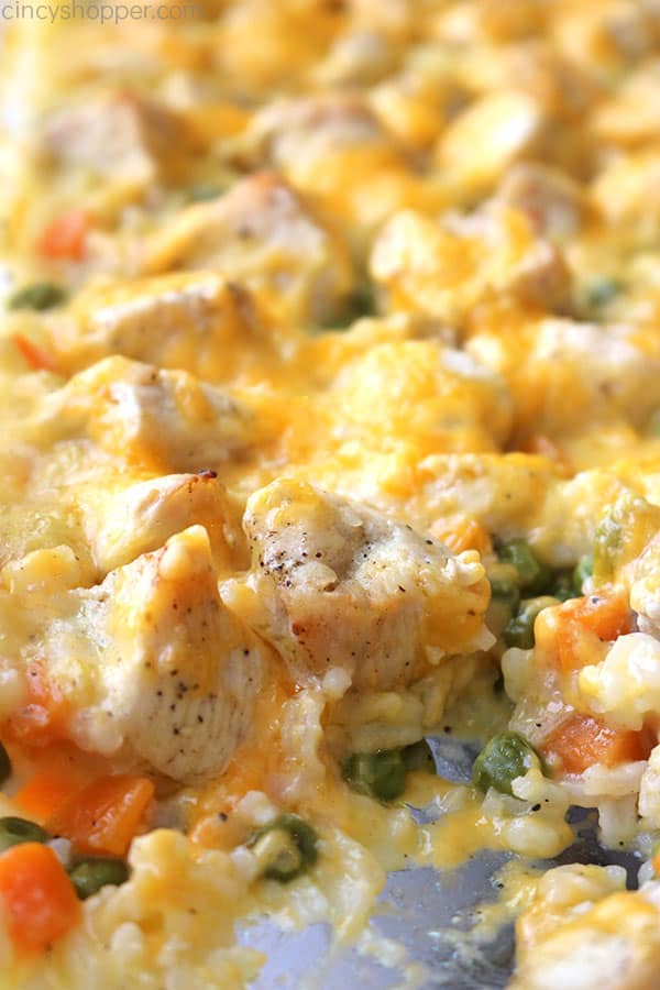 Easy Cheesy Chicken and Rice Casserole is perfect for a quick weeknight dinner. A simple comfort food dish that is sure to become a regular on your dinner table.