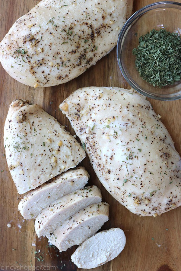 Oven Baked chicken Breast on board.