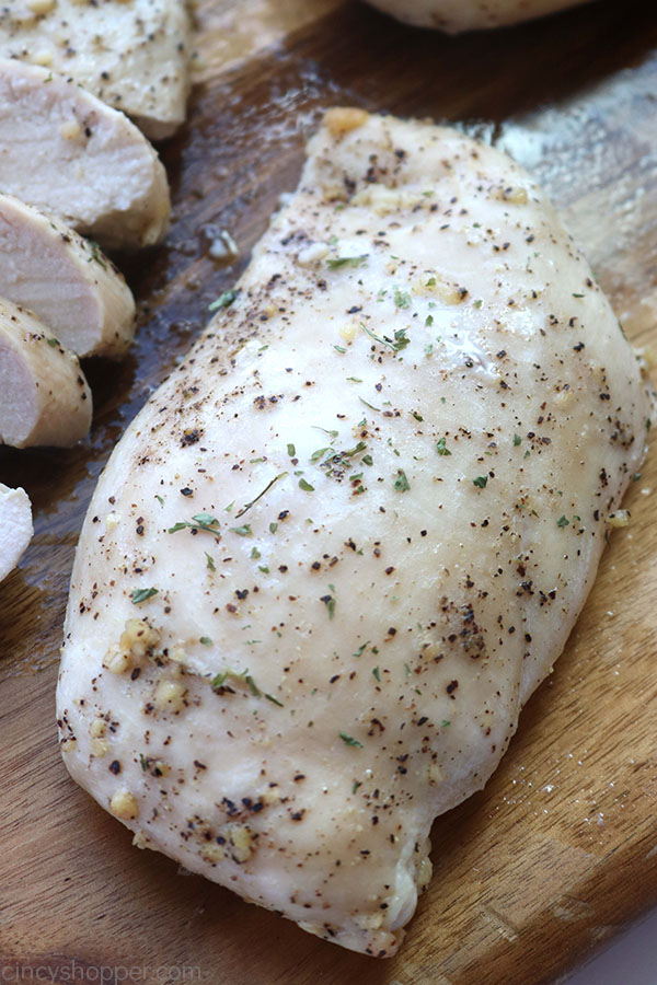 Unsliced whole baked chicken breast.