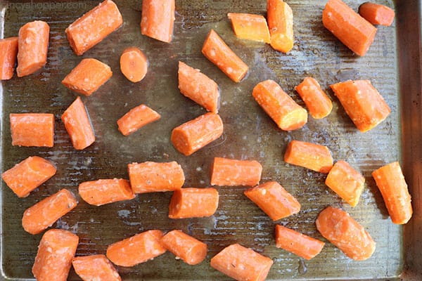 Carrots on sheet pan for roasting.