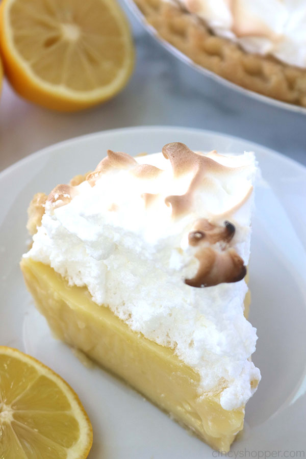 Lemon pie with meringue on a plate.