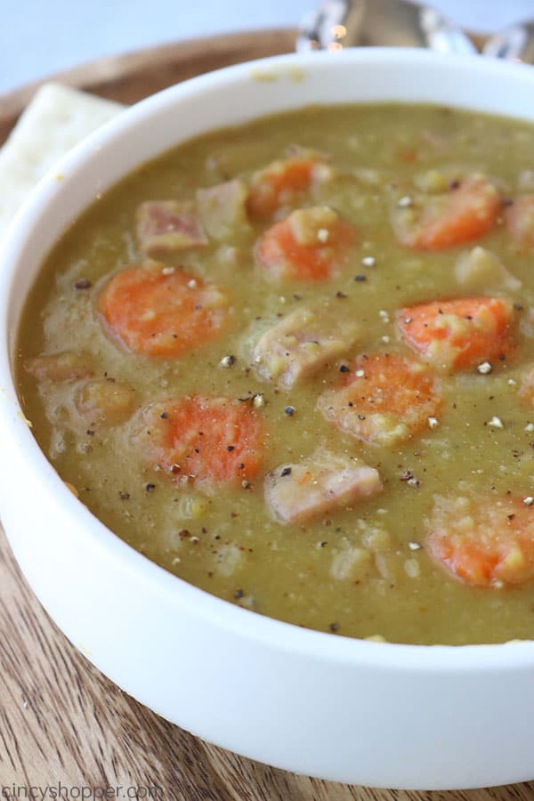 Split Pea Soup with carrots and ham in a bowl.