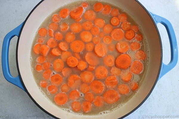 Glazed carrots in a pan ready for cooking.