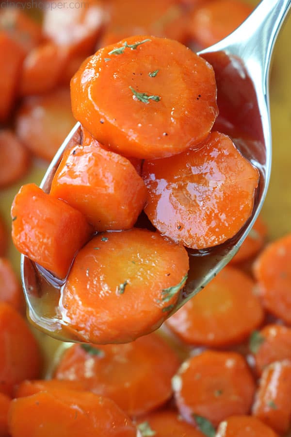 Brown Sugar Glazed Carrots on a spoon.