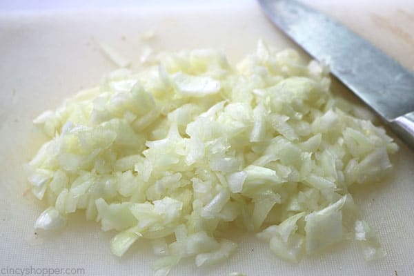 Dicing the onion for breakfast potatoes.