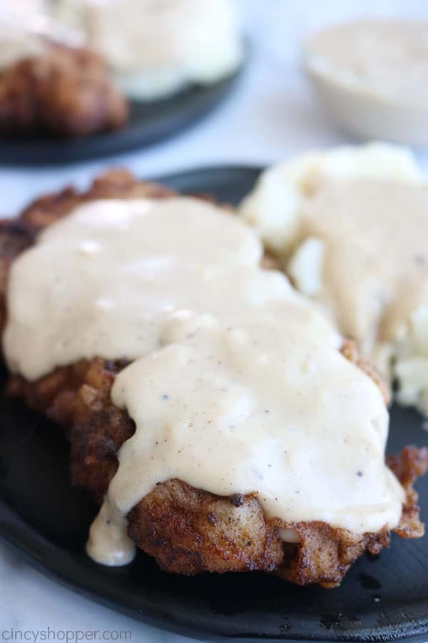 Plated Chicken Fried Steak with gravy and mashed potatoes.