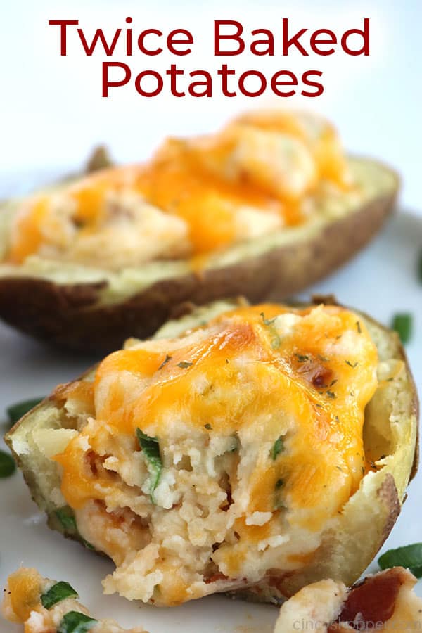 Twice Baked Potatoes on a plate with text.
