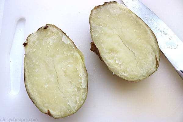 Potatoes cut in half to make easy twice baked potatoes.