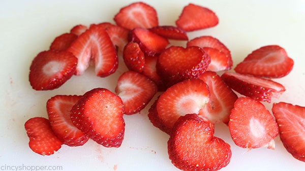 Sliced strawberries for American Flag Cake.
