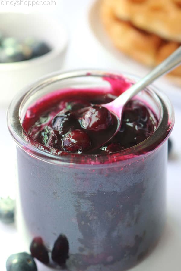 Easy Blueberry Sauce in glass jar.