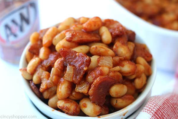 Root beer baked beans in a white bowl.