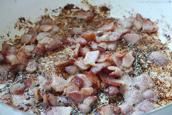 Fried bacon in a pan.
