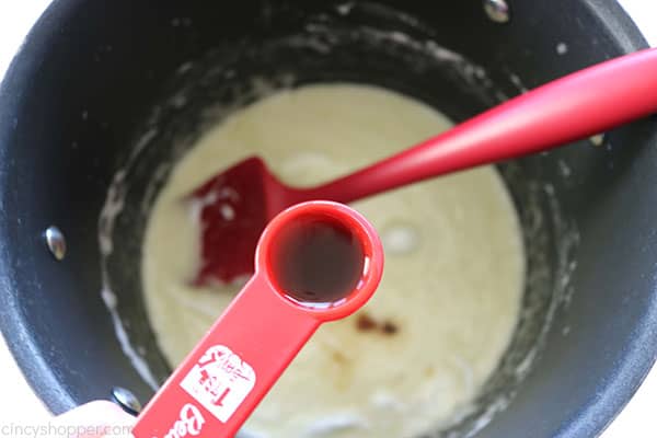 Adding the vanilla when making Krispie treats at home.