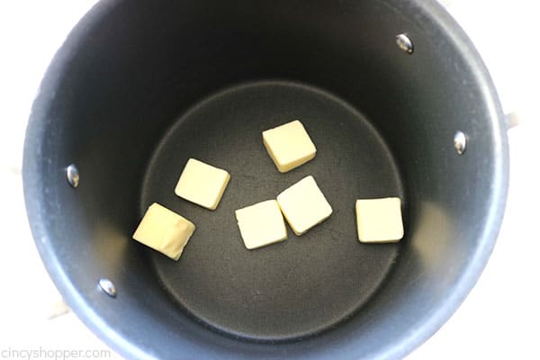 Melting the butter for Rice Krispie Treats.