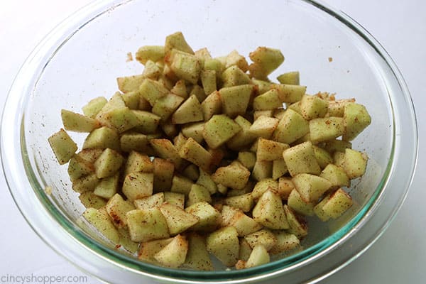 Diced Apples in a bowl to make cheesecake bars