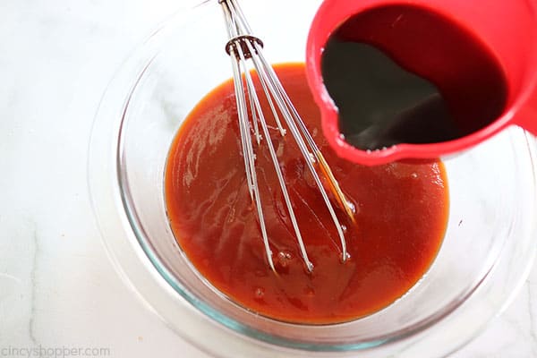 Making Dr. Pepper barbecue sauce.