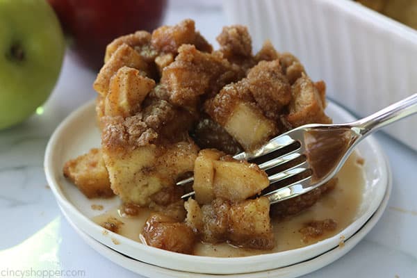 Apple Overnight French Toast Bake with a fork.