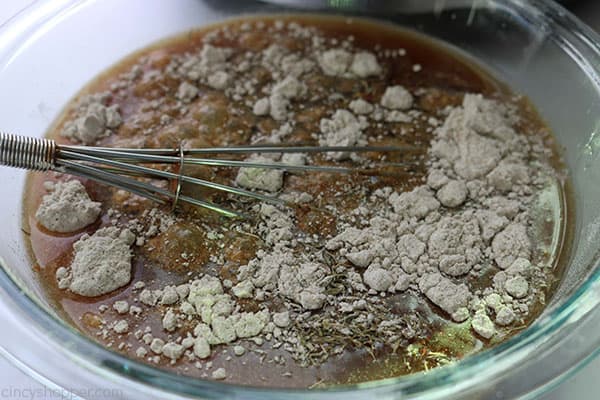 Whisking gravy mixture for beef stew.