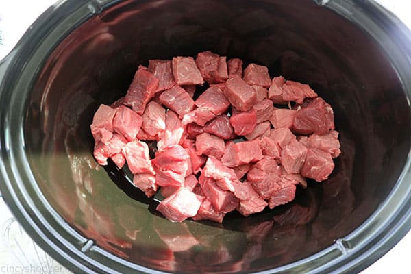 Stew meat in slow cooker.