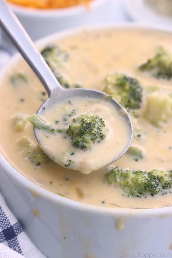 Slow Cooker Broccoli Cheese Soup on a spoon.