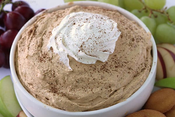 Easy Fluffy Pumpkin Dip in a bowl with fruit.