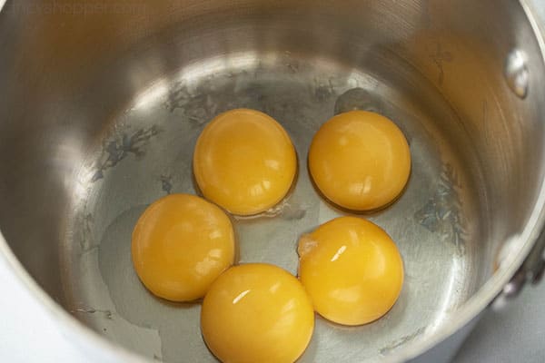 egg yolks in a sauce pan