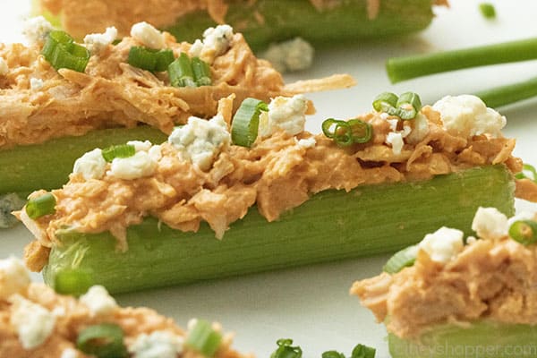 slices of celery stuffed with Buffalo chicken