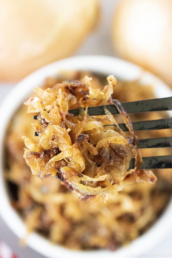 golden brown caramelized onions on a fork