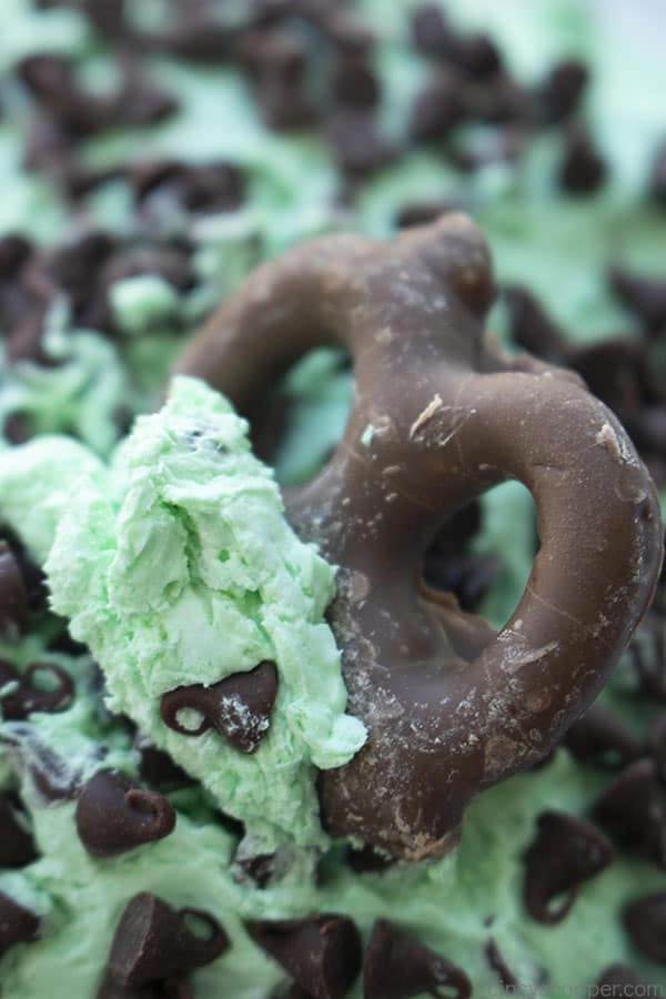 Chocolate pretzel dipped in creamy mint dip