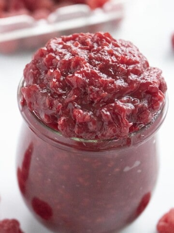 weck jar filled with raspberry filling for desserts
