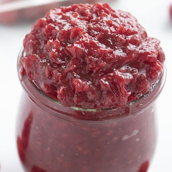 weck jar filled with raspberry filling for desserts