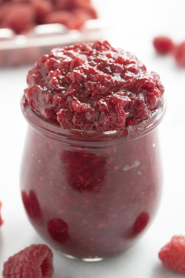 jar of homemade raspberry cake filling