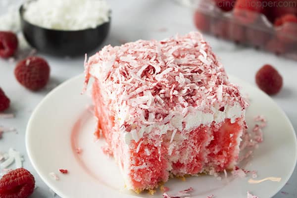 Fresh Raspberry Zinger Poke Cake with coconut