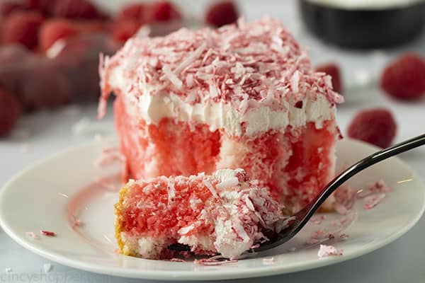 Fork with moist Raspberry Zinger Poke Cake