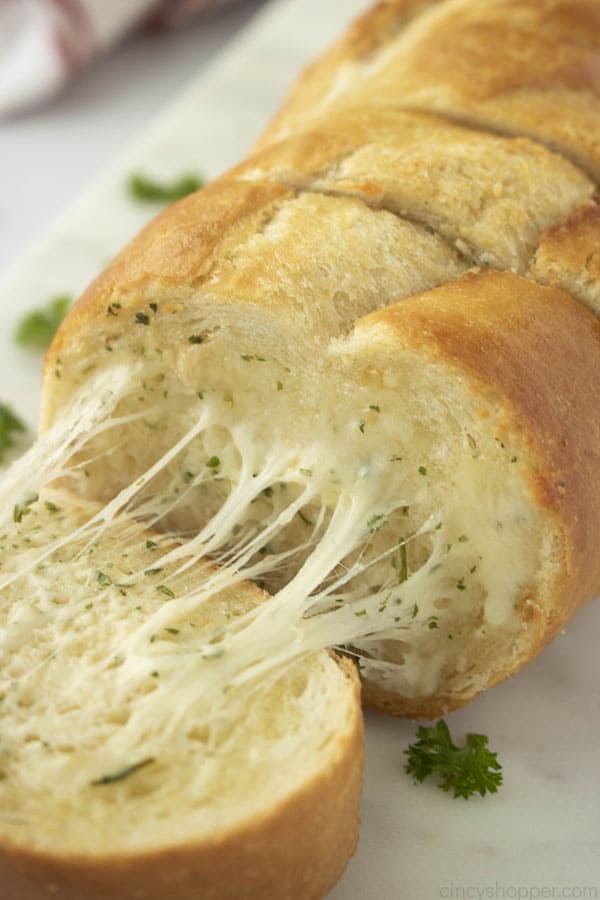 cheesy interior of a loaf of garlic bread