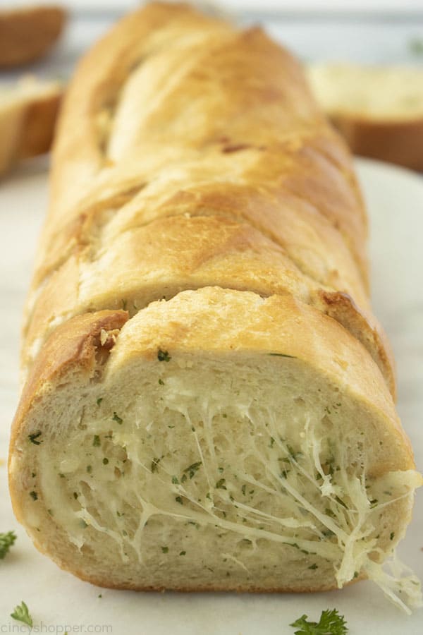 top view looking down on a loaf of cheesy garlic bread