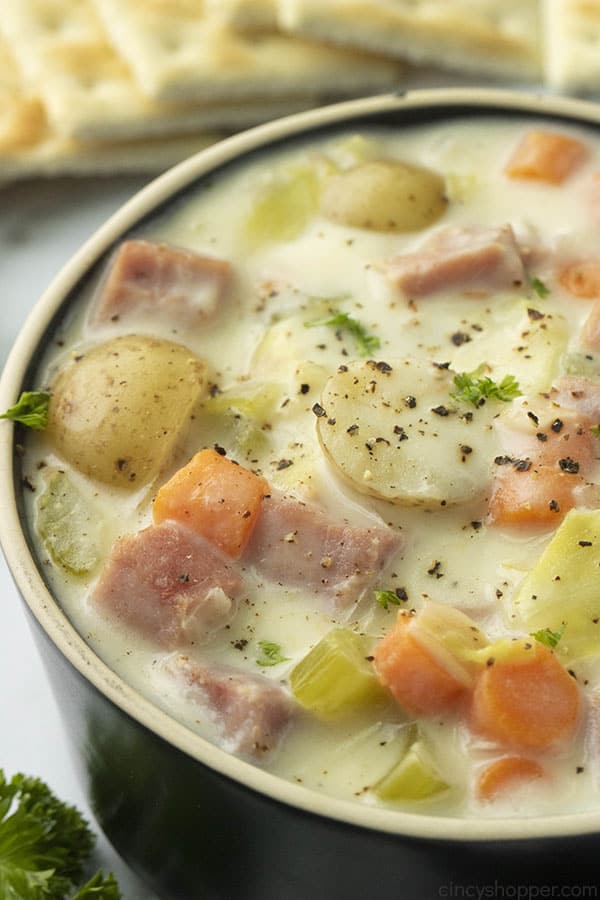 The Best Creamy Cabbage Soup in a black bowl