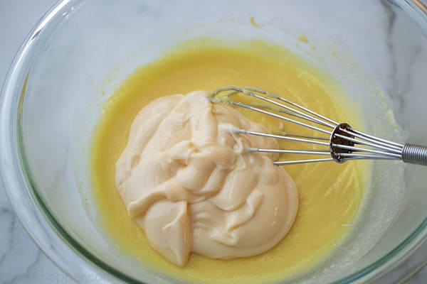 Orange yogurt and vanilla pudding in a bowl
