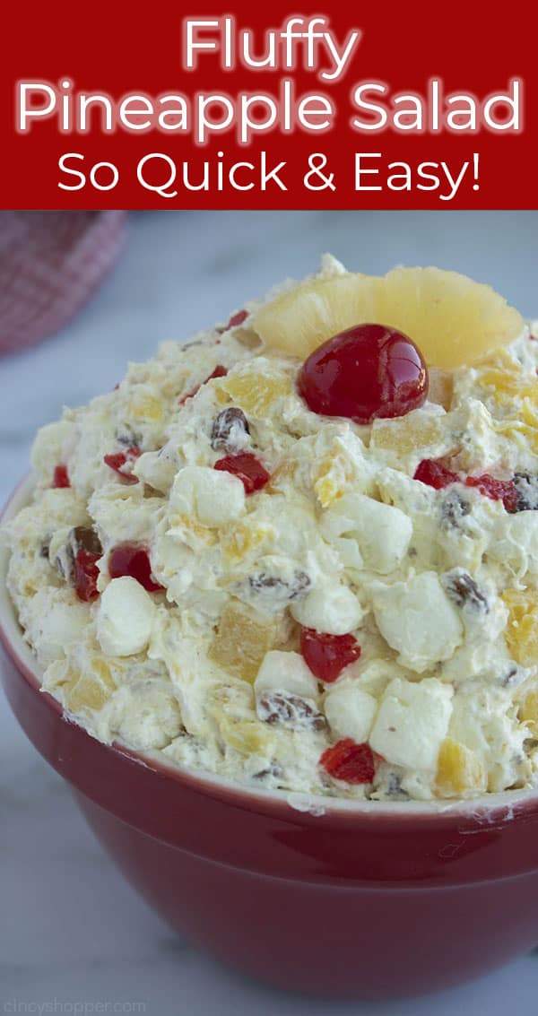 Pineapple Salad in a red bowl with cherry on top