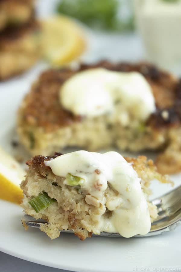 salmon on fork with tartar sauce