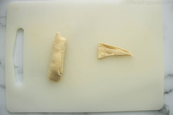 two piece of uncooked crescent roll dough