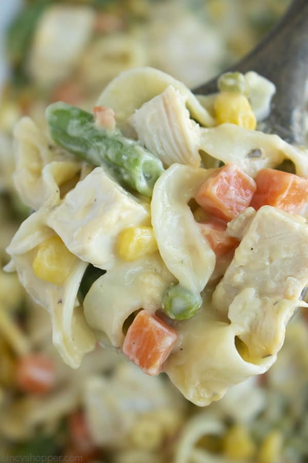 close up of chicken casserole with noodles on a fork