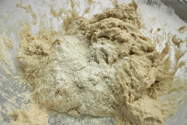 making a bread recipe - incorporating flour into shaggy dough